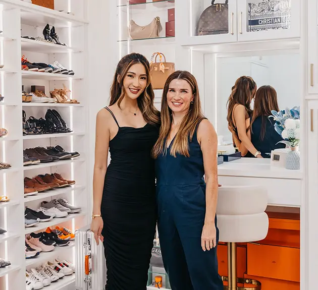 Women standing in newly designed closet