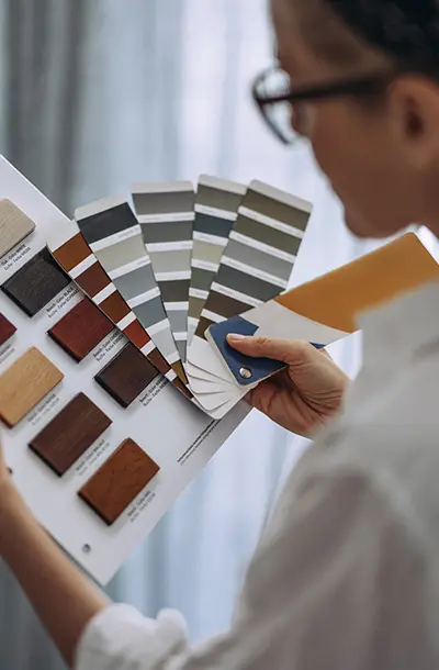 Designer reviewing color swatches
