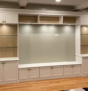 Custom built-in entertainment center with white cabinetry
