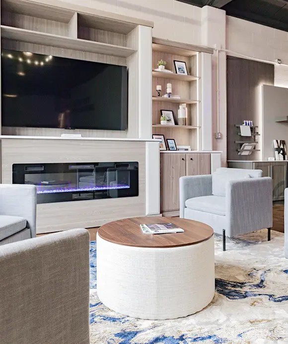 Built in entertainment center shelving with fireplace