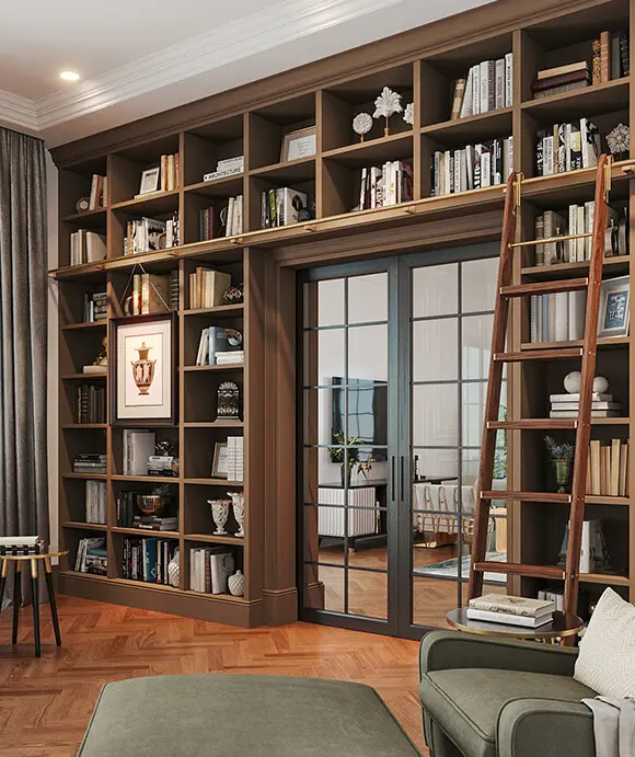 Floor-to-ceiling custom bookcase with built-in shelving and a rolling ladder, framing glass double doors that lead to an adjacent room