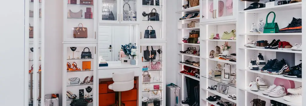 Boutique-style closet with white shelving