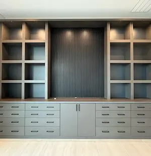 Modern built-in storage unit with symmetrical open shelving