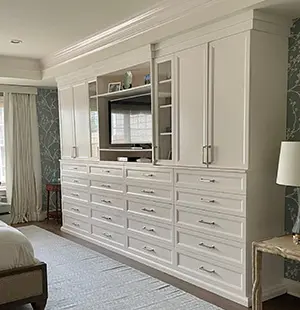 Wardrobe closet with drawers and built in TV area