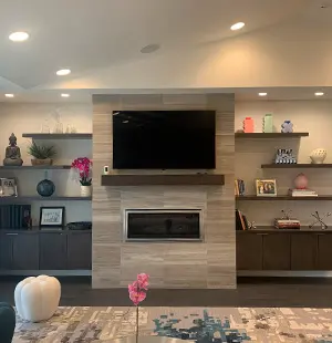 Built in media center with floating shelves and LED lighting