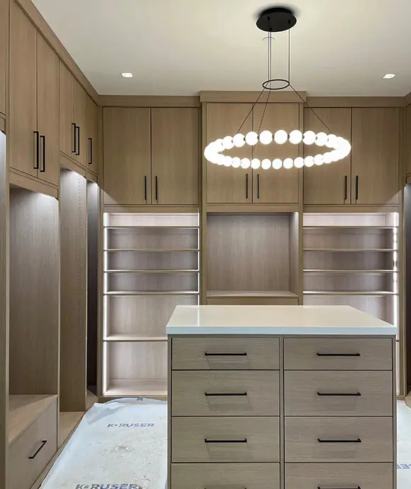 Walk in closet with LED lighting, custom island