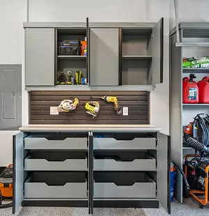 Celadon melamine with matte black extruded handles, Slatwall backing