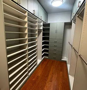 Custom walk in closet with pull out drawers