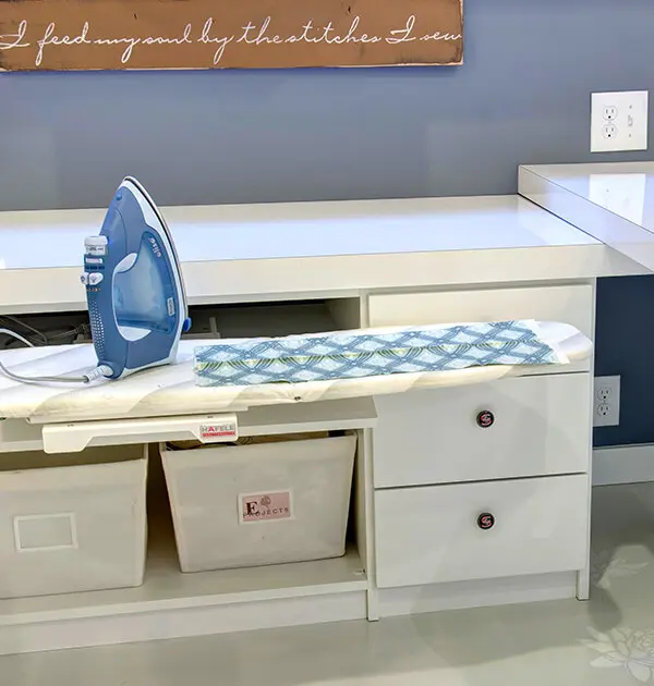 Pull out ironing board in craft room