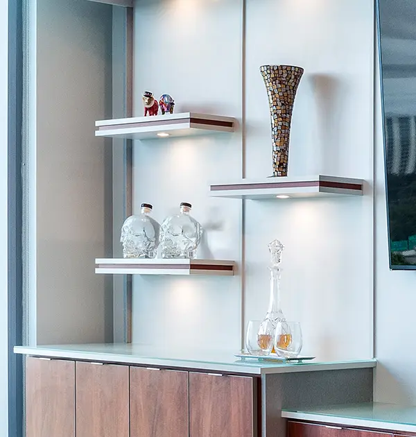 Floating shelves in media center