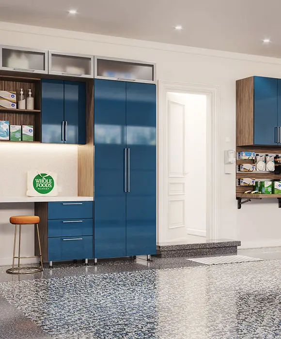 Custom garage with blue high-gloss cabinetry