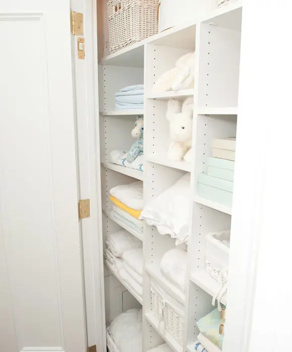white linen closet with kids linen