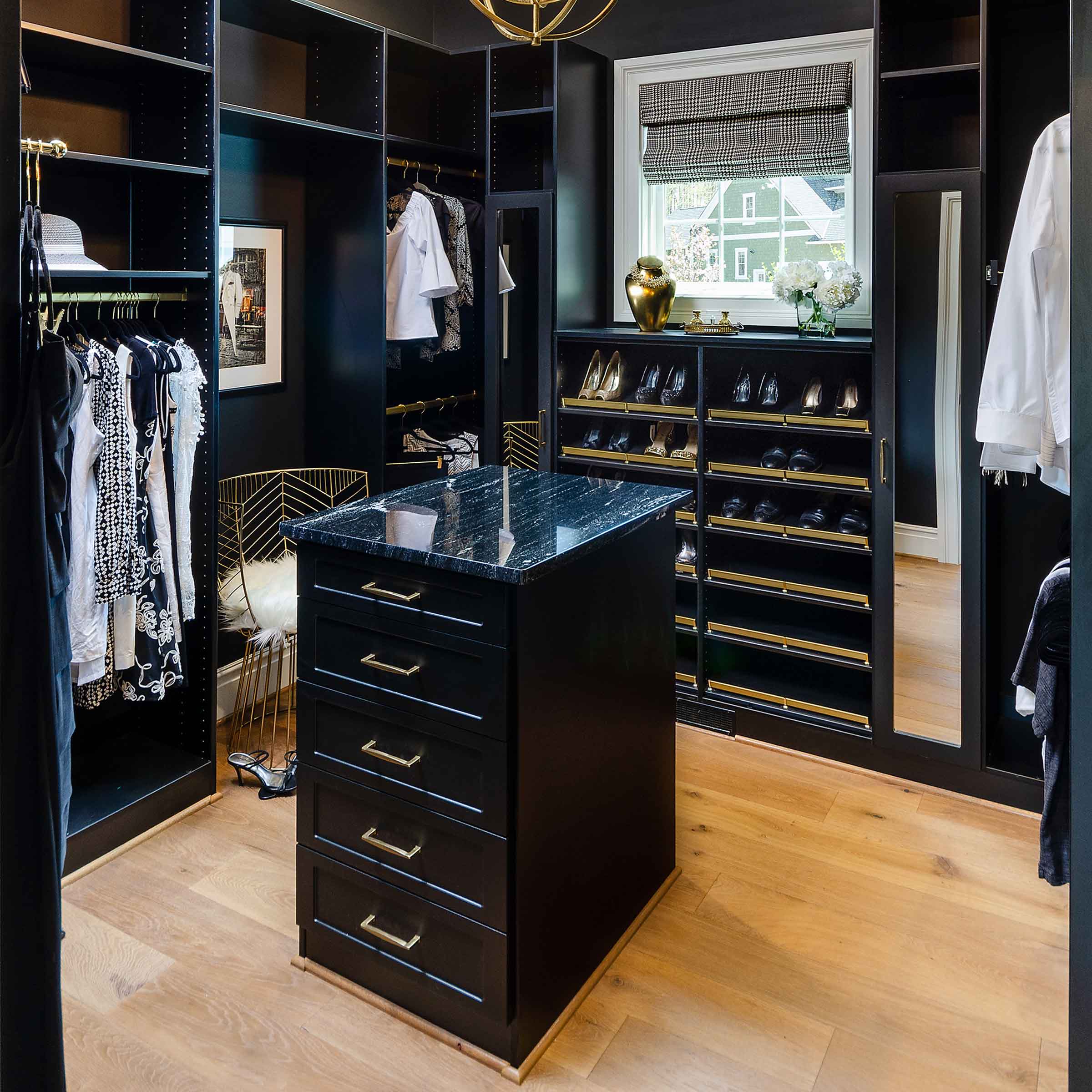 Black showroom home custom closet center island