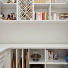 Custom pantry organizers with pull-out snack drawers and coffee bar