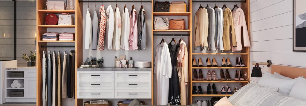 Custom built-in closet system featuring natural wood and white finishes, with hanging rods, drawers, shelves, and cubbies for clothing, shoes, handbags, and accessories