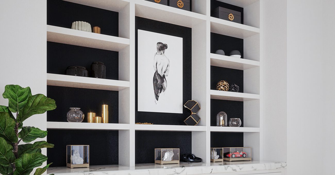 Custom white shelving with contrasting black back panels for displaying decorative items.