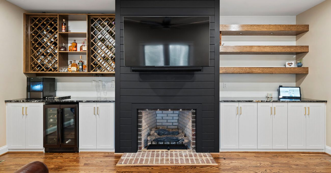 Custom wine bar with wine lattice and custom bar cabinetry