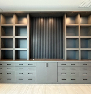 Modern built-in storage unit with symmetrical open shelving