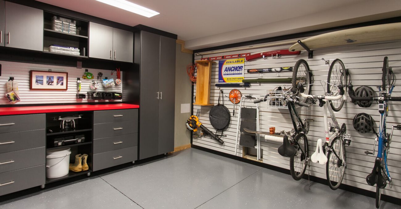 Custom garage slatwall organizer for bikes, surf boards, and tools