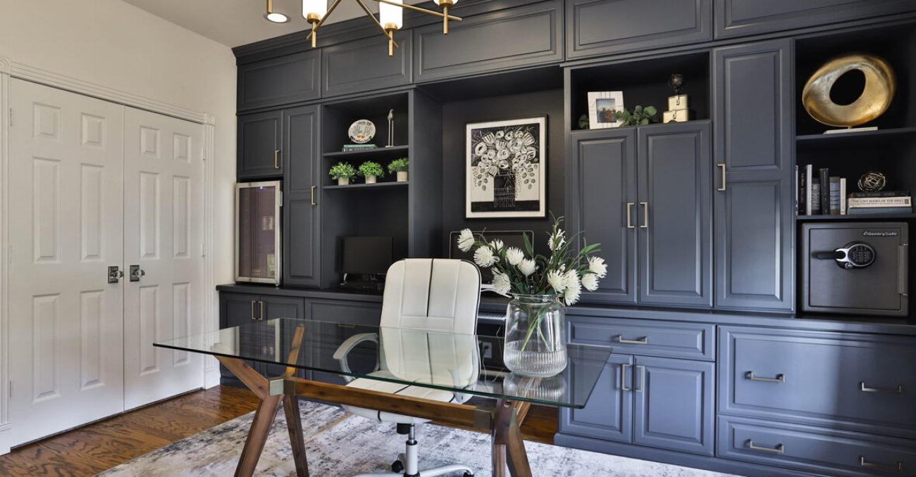 Custom home office grey cabinetry with wall safe and mini fridge