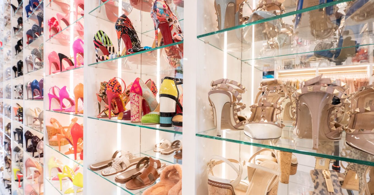 Custom shoe display on glass shelving