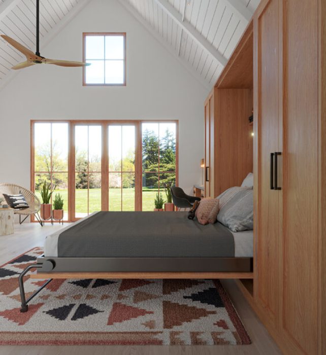 Mid-century inspired wall bed with natural wood cabinetry, built-in bookshelves