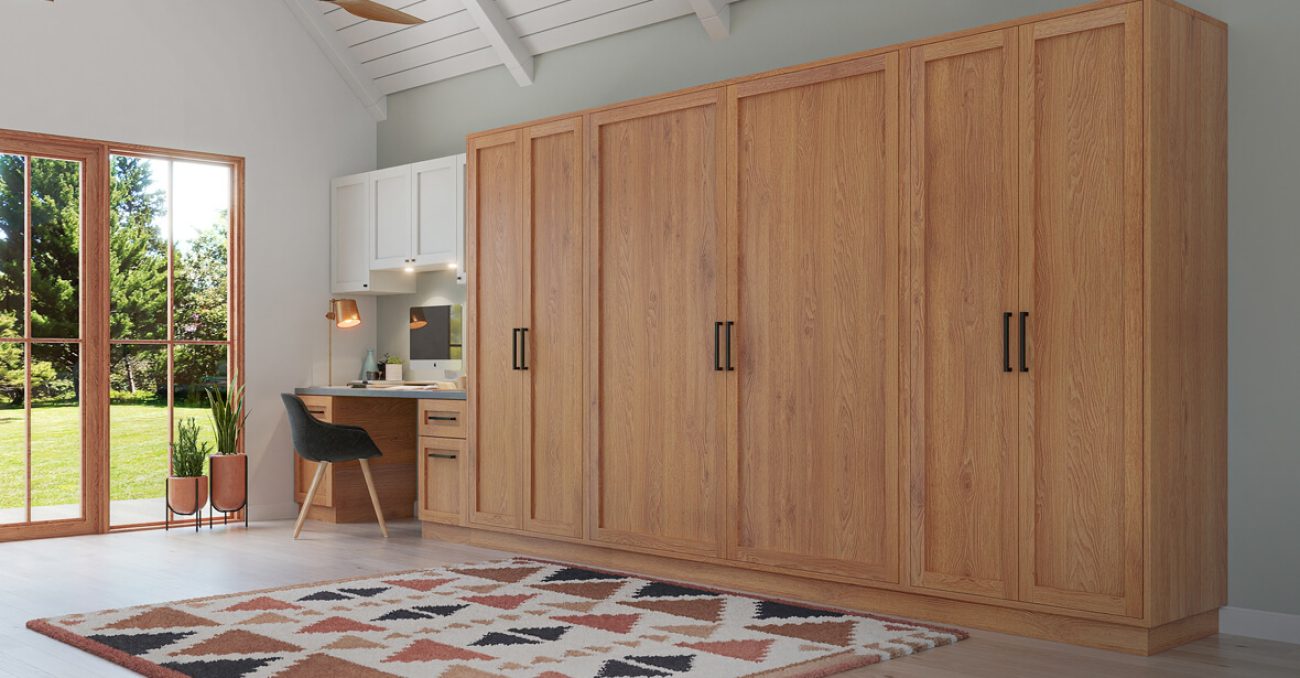 Wall bed with integrated storage and workstation