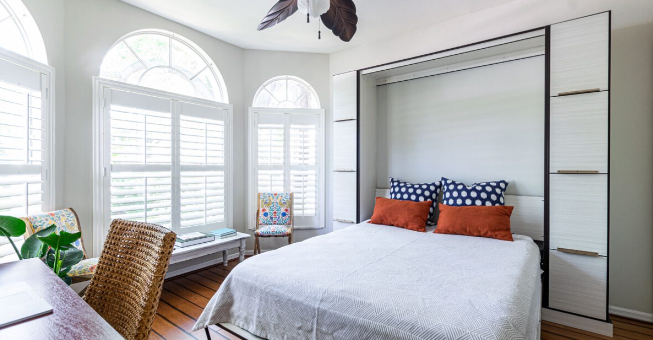 Murphy bed with a hidden frame wall feature