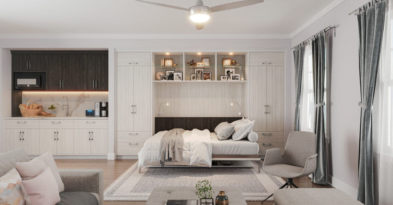 Custom Murphy bed with light woodgrain melamine and LED lighting, glass floating shelves, and custom cabinetry