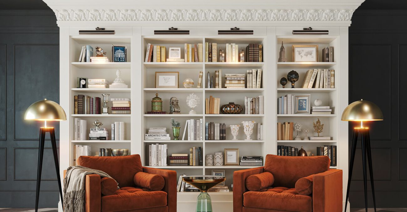 Elegant white built-in wall unit with crown molding, library lighting