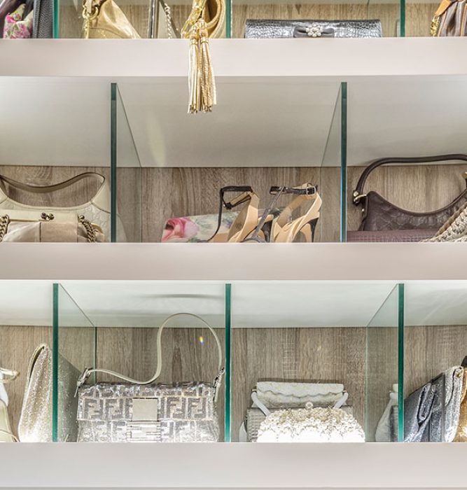 glass shelf dividers create stylized cubbies