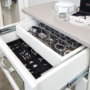 Double deck jewelry drawer with velvet bottom, sliding upper with Lucite inserts. Removable Lucite top tray for earrings