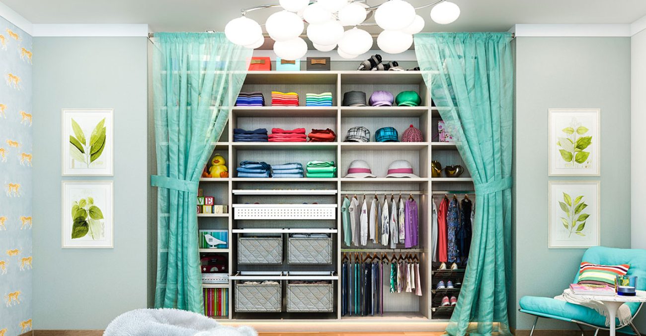 Children's closet with double handing rods and quilted fabric pull-out baskets.