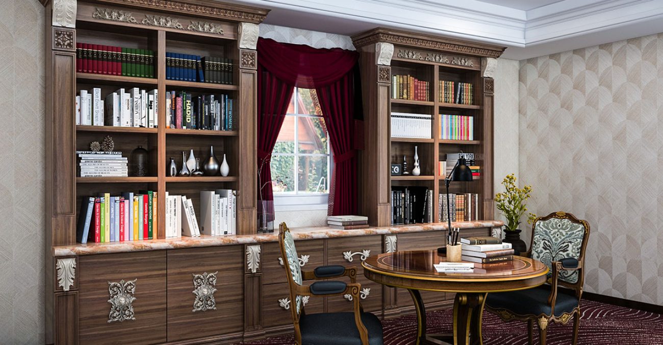 Traditional library built-ins with ornate trim and crown molding, carved corbels, and inset panel doors.