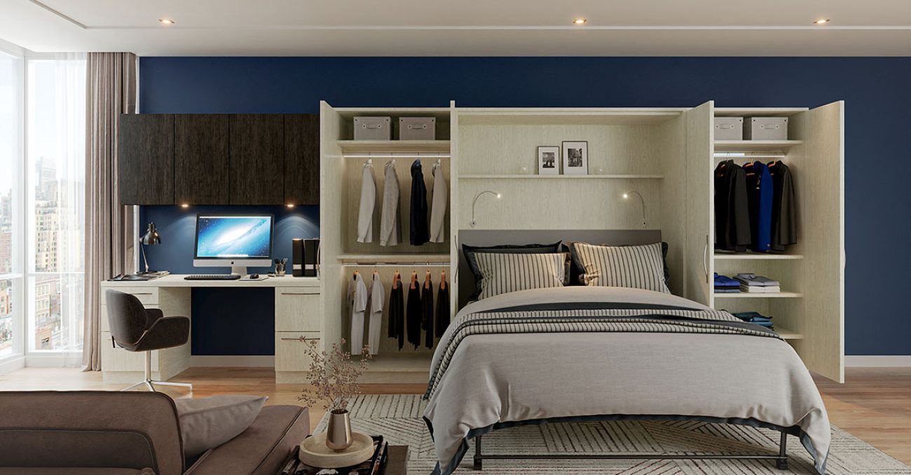 Wall bed with integrated work station, goose neck lighting, LED hanging rods, and dual-tone cabinets.
