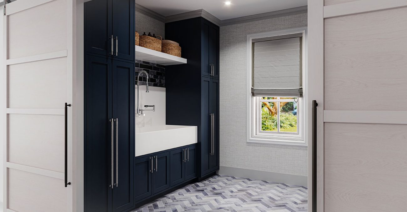 Full height cabinetry with built-in laundry sink and open shelving for woven baskets.